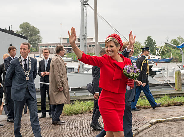 King Willem Alexander and Queen maxima waving to the people stock photo