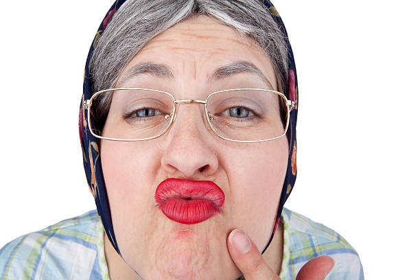 Kiss Granny An old woman puckering up for a kiss. ugly old women stock pictures, royalty-free photos & images