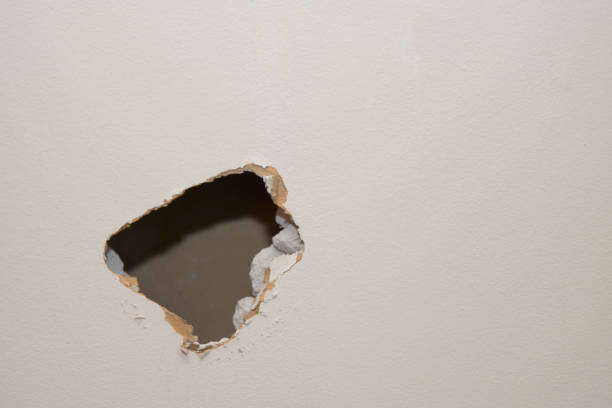 Kitchen Remodel Hole in Wall Lower Left stock photo