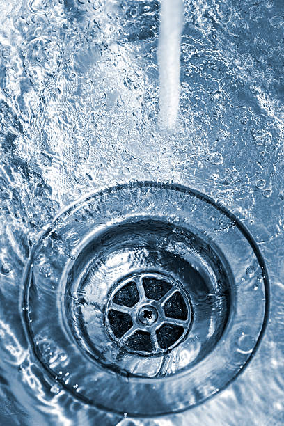 kitchen sink with water stock photo