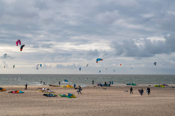 Kiteboarders or Kitesurfers at the Brouwersdam in Zeeland stock photo