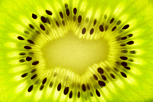 Close up of a slice of kiwi fruit