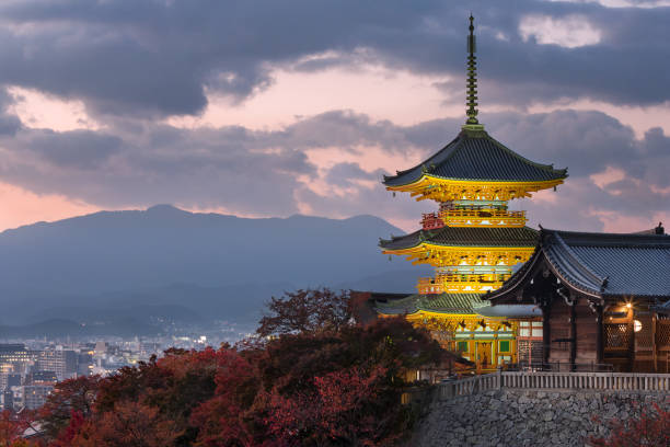 Kiyomizu-dera pagoda overlooking Kyoto Kyoto, Japan - November 9, 2017:Three-story Kiyomizu-dera buddhist pagoda overlooking the city. kyoto prefecture stock pictures, royalty-free photos & images