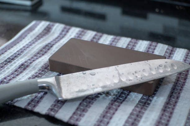Newly Sharpened Chef Knife on Wet Whetstone