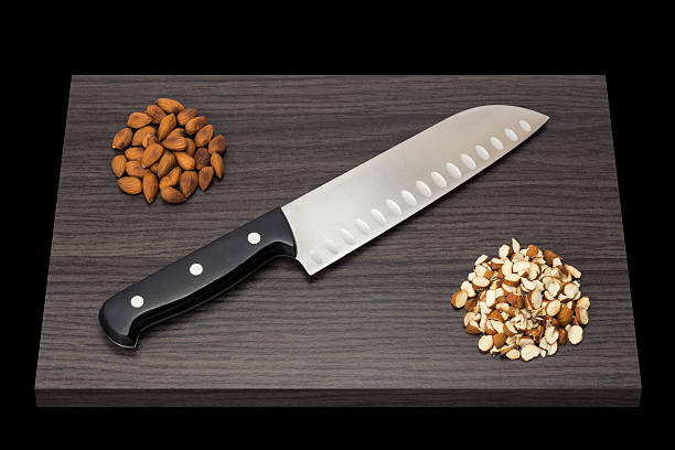 Knife with almonds stock photo