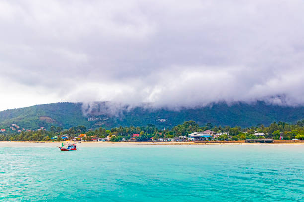 Koh Samui trip and panoramic view of beach on cloudy and rainy day. stock photo