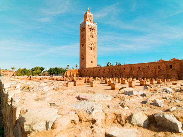 Koutoubia Mosque is the largest mosque in Marrakesh, Morocco. The historical mosque located near the Djemaa el Fna. Koutoubia Mosque is the largest mosque in Marrakesh, Morocco. Koutoubia Mosque was built during the 12th century by the Almohad dynasty. Now, at 70 meters high, the minaret remains the highest structure. The prayer hall in the mosque can accommodate 25 thousand worshipers and is a staggering 54 square meters in size. The pulpit in the mosque is believed to have originated in Cordoba and was donated to the mosque by Sultan Al Ben Youssef. koutoubia mosque stock pictures, royalty-free photos & images