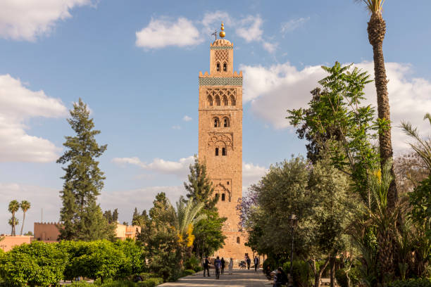 Koutoubia Mosque Marrakesh, Morocco - 1 May, 2013: Park and garden in front of the minaret of Koutoubia Mosque, Marrakesh, Morocco koutoubia mosque stock pictures, royalty-free photos & images
