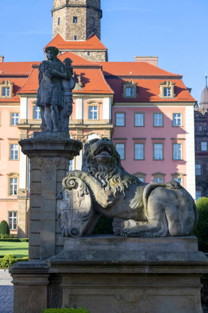 Ksiaz Castle, medieval mysterious 13th century fortress, stone statue of lion, Walbrzych, Poland stock photo