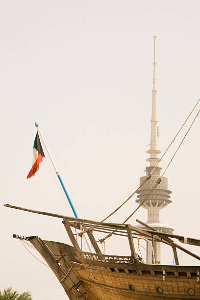 Kuwait liberation tower and dhow stock photo