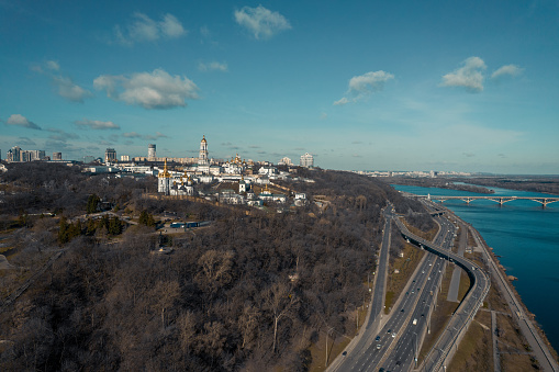 View of the Kyiv Pechersk Lavra and the highway near the Dnieper River in Ukraine.