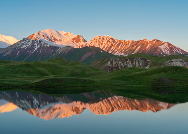 Kyrgyzstan mountains Sunrise Sun rising over mountains in Kyrgyzstan tien shan mountains stock pictures, royalty-free photos & images