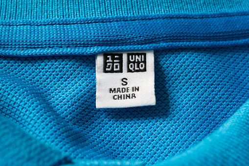 Label Tag On Uniqlo Shirt Stock Photo - Download Image Now - iStock