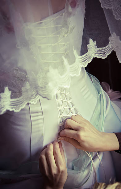 Lacing up the wedding dress  bodice stock pictures, royalty-free photos & images