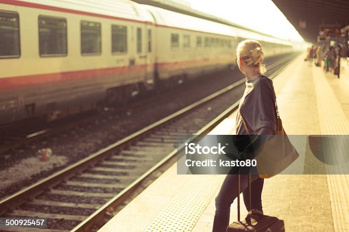 istock Lady waiting at the railway station. 500925457