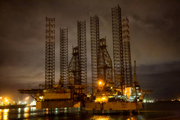 Lagos Offshore oil rig at night Lagos Nigeria Oil Rig lagos nigeria stock pictures, royalty-free photos & images