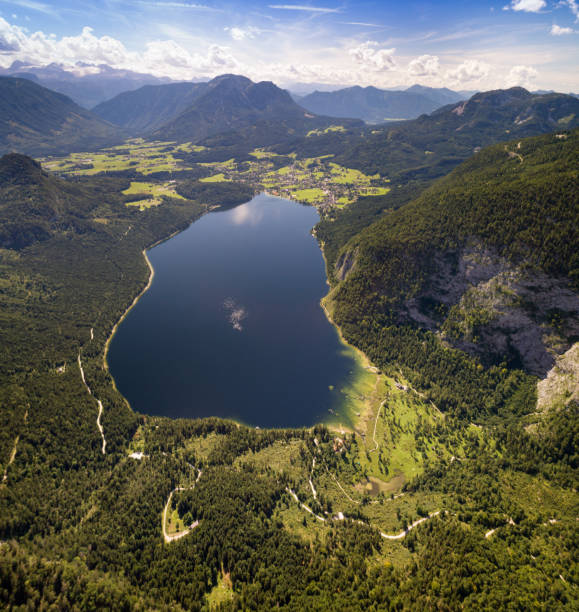 Lake Altaussee with Dachstein Glacier, Austria, Aerial Panorama Panorama of the beautiful Lake Altaussee with the Dachstein Glacier in back in the middle auf the Austrian Alps. Nature Reserve. Steiermark. Ausseerland. ausseerland stock pictures, royalty-free photos & images