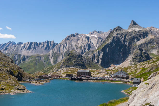 Lake and buildings at the Great St Bernard Pass stock photo