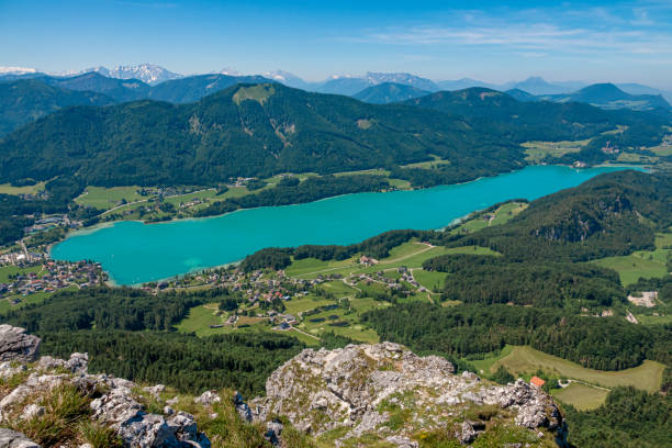 Lake Fuschlsee, is Salzkammergut, Austria, in summer Lake Fuschlsee, Austria in summer fuschl lake stock pictures, royalty-free photos & images