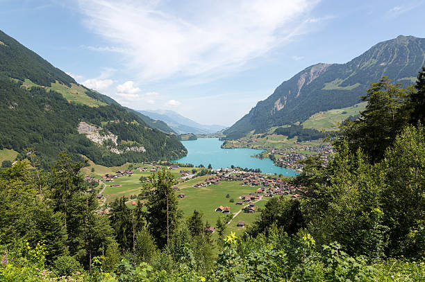 Lake Lungern in Central Switzerland near Lucerne Lake Lungern in Central Switzerland near Lucerne lungern village switzerland lake stock pictures, royalty-free photos & images