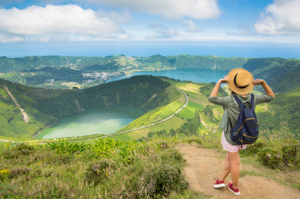 Lake of the seven cities - lagoa das sete cidades -Island of Sao Miguel ,Azores, Portugal Young Girl Looking At Volcano Crater acores stock pictures, royalty-free photos & images