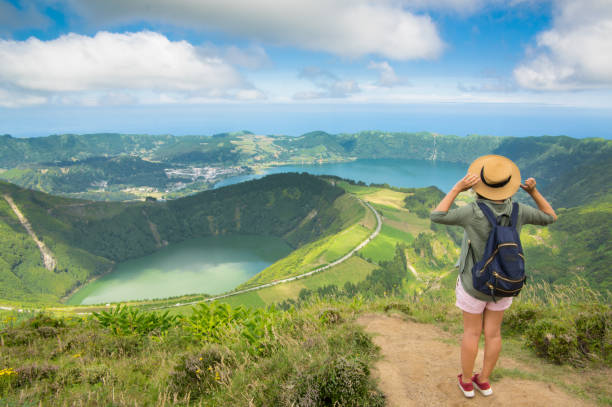 Lake of the seven cities - lagoa das sete cidades -Island of Sao Miguel ,Azores, Portugal Young Girl Looking At Volcano Crater acores stock pictures, royalty-free photos & images