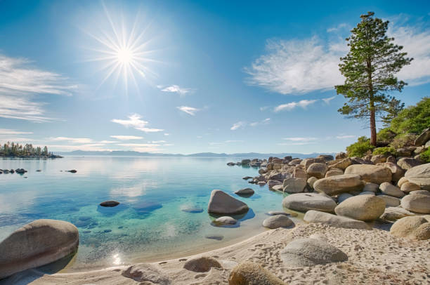 Lake Tahoe Lake Tahoe east shoreline, rocky beach in sunny day lakeshore stock pictures, royalty-free photos & images