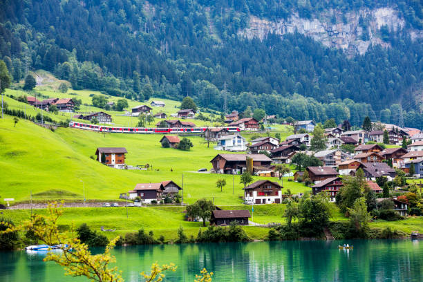 Lake view in Lungern or Lungerersee in Obwalden, Switzerland Lake view in Lungern or Lungerersee in Obwalden, Switzerland. lungern village switzerland lake stock pictures, royalty-free photos & images