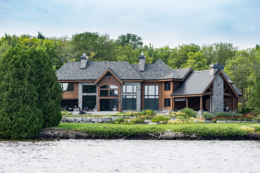 Lac St-Joseph, Сanada - August 18, 2015: Luxurious lakefront property located in Lac St-Joseph, a rich suburb of Quebec City on a sunny day of summer.