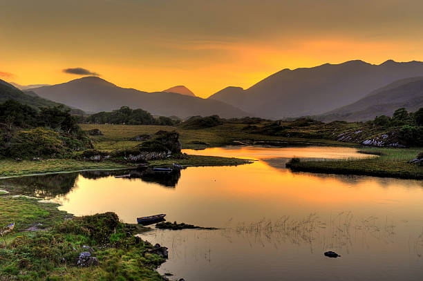 Lakes of Killarney Lakes of Killarney, County Kerry. McGillicuddy Reeks in the distance, Highest mountain range in Ireland county kerry stock pictures, royalty-free photos & images