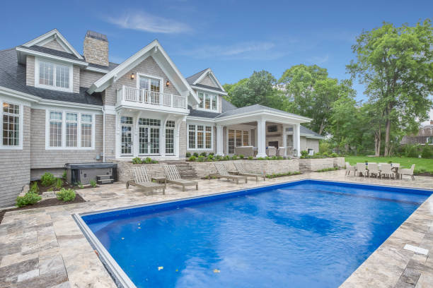 Lakeside home with pool in the rear stock photo