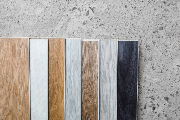 laminate flooring planks variations on concrete floor laminate flooring planks variations on concrete floor, close-up view wood laminate flooring stock pictures, royalty-free photos & images