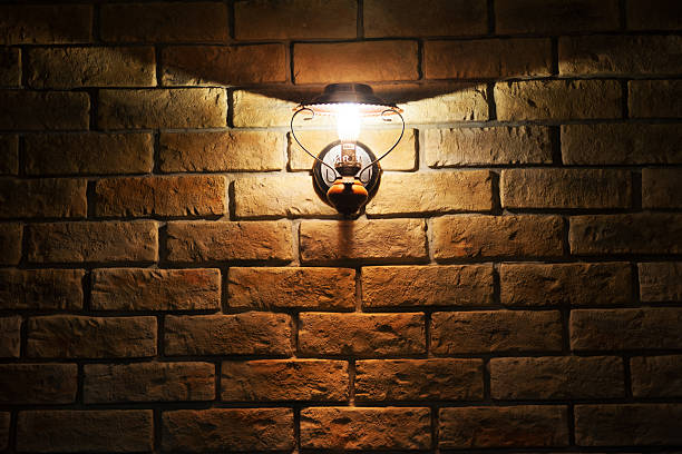 Lamp on the brick wall stock photo