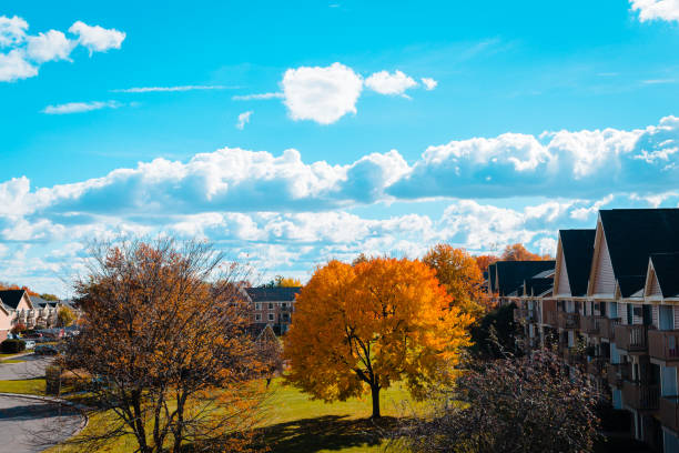 Landscape of an apartment complex in Grand Rapids Michigan during the fall stock photo