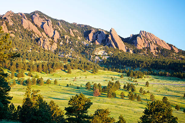 Landscape of flatirons in Boulder, Colorado Sunrise over the Flatirons in Boulder Colorado. boulder colorado stock pictures, royalty-free photos & images
