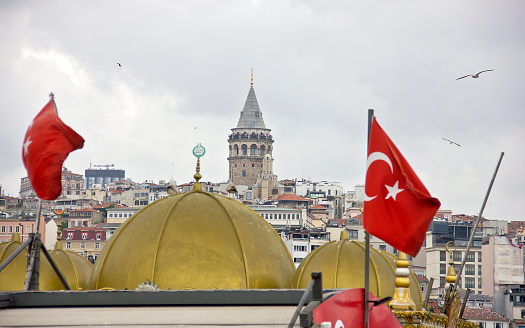 street of Eminonu, a former district of Istanbul, Turkey, with the Galata Tower