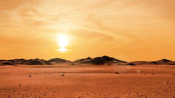 landscape on planet Mars at sunrise, desert with mountain range on the red planet stock photo