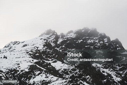 istock Landscape View of snowy mountains and hills from train trip and in central anatolia. 1397098877