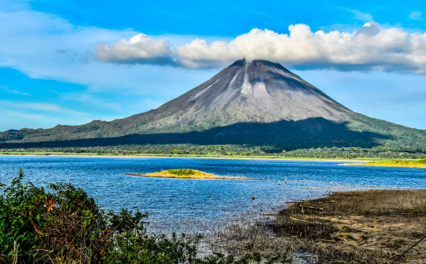 landscape with Arenal Volcan in costa rica central america stock photo
