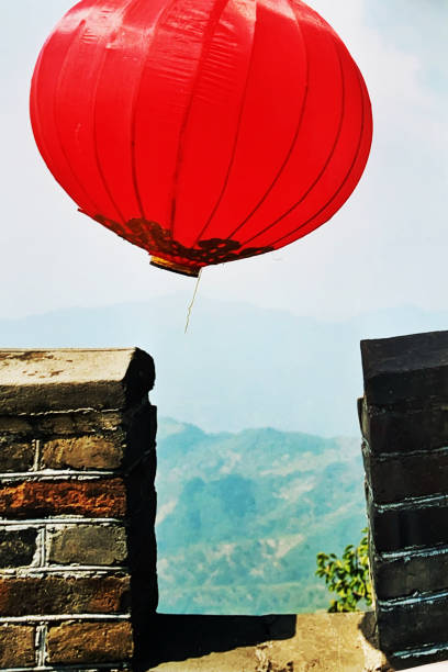 Lantern at the Great Wall of China, Beijing Red lantern at the Great Wall at the Mutianyu section. Scanned photo. mutianyu stock pictures, royalty-free photos & images