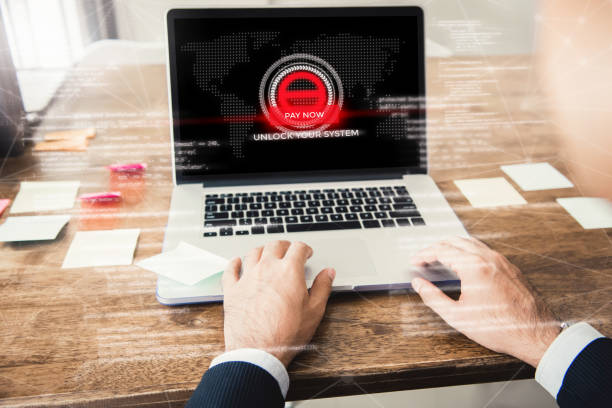 Laptop computer with the system being locked by ransomware stock photo