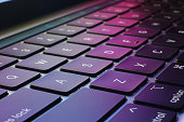 istock laptop/notebook keyboard with colorful background 1332153694