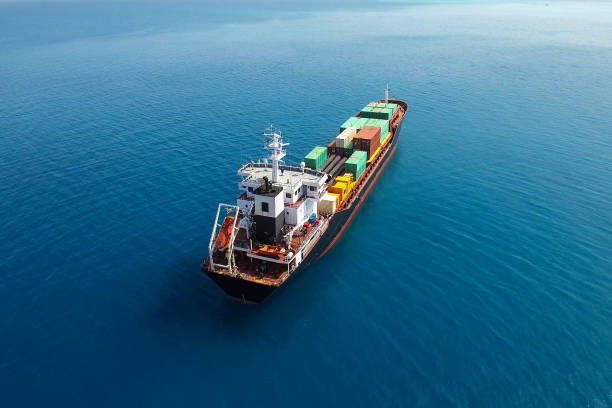 large container ship at sea - aerial image - aerial container ship imagens e fotografias de stock