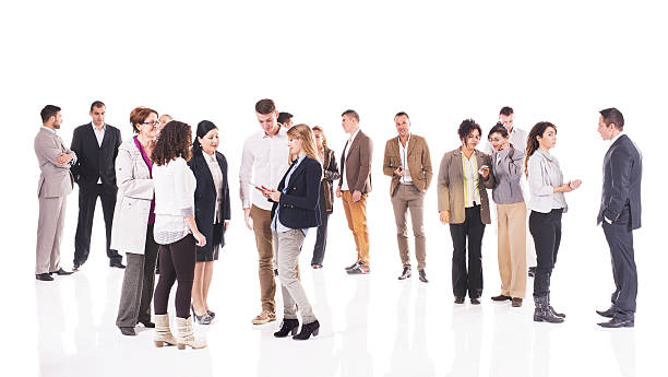 Large group of business people standing and talking. stock photo
