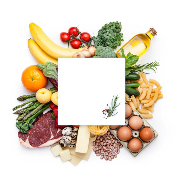 Large group of different kind of food shot from above with copy space Top view of a large group of different types of food shot on white background. A blank card with useful copy space for text and/or logo is at the center of the frame placed over the food. Types of food included in the composition are fruits, vegetables, meat, dairy products, pasta, cooking oil, beans and others. DSRL studio photo taken with Canon EOS 5D Mk II and Canon EF 70-200mm f/2.8L IS II USM Telephoto Zoom Lens uncooked pasta stock pictures, royalty-free photos & images