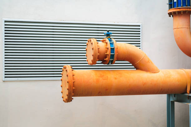Large orange water pipe system. stock photo