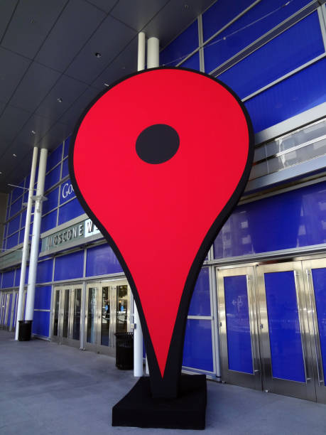Large red Google Maps location icon at the Entrance to Google IO Android Convention stock photo