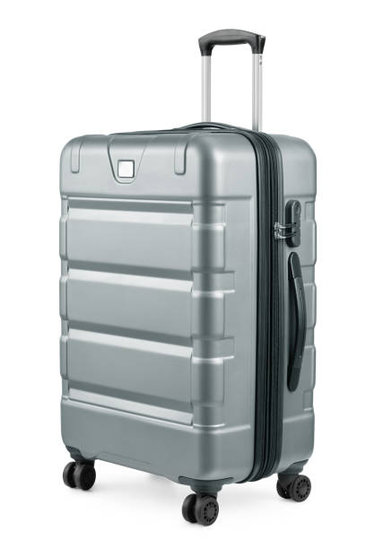 Large silver plastic suitcase Large silver plastic suitcase isolated on white luggage stock pictures, royalty-free photos & images