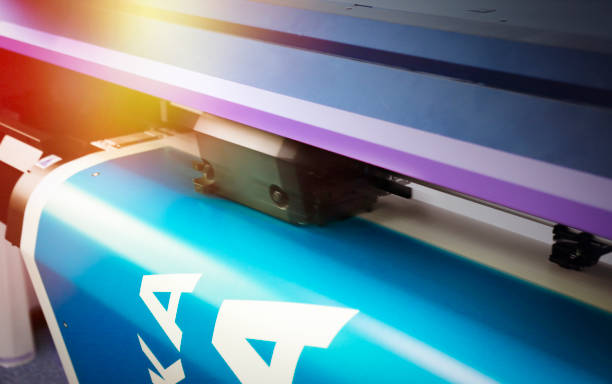 Large size printer printing Detail of a large size printer inkjet plotter printing printing plant stock pictures, royalty-free photos & images