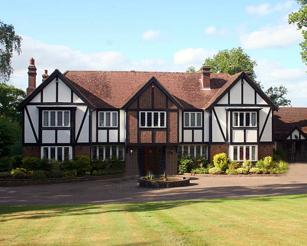 Large white and brown British Tudor house stock photo